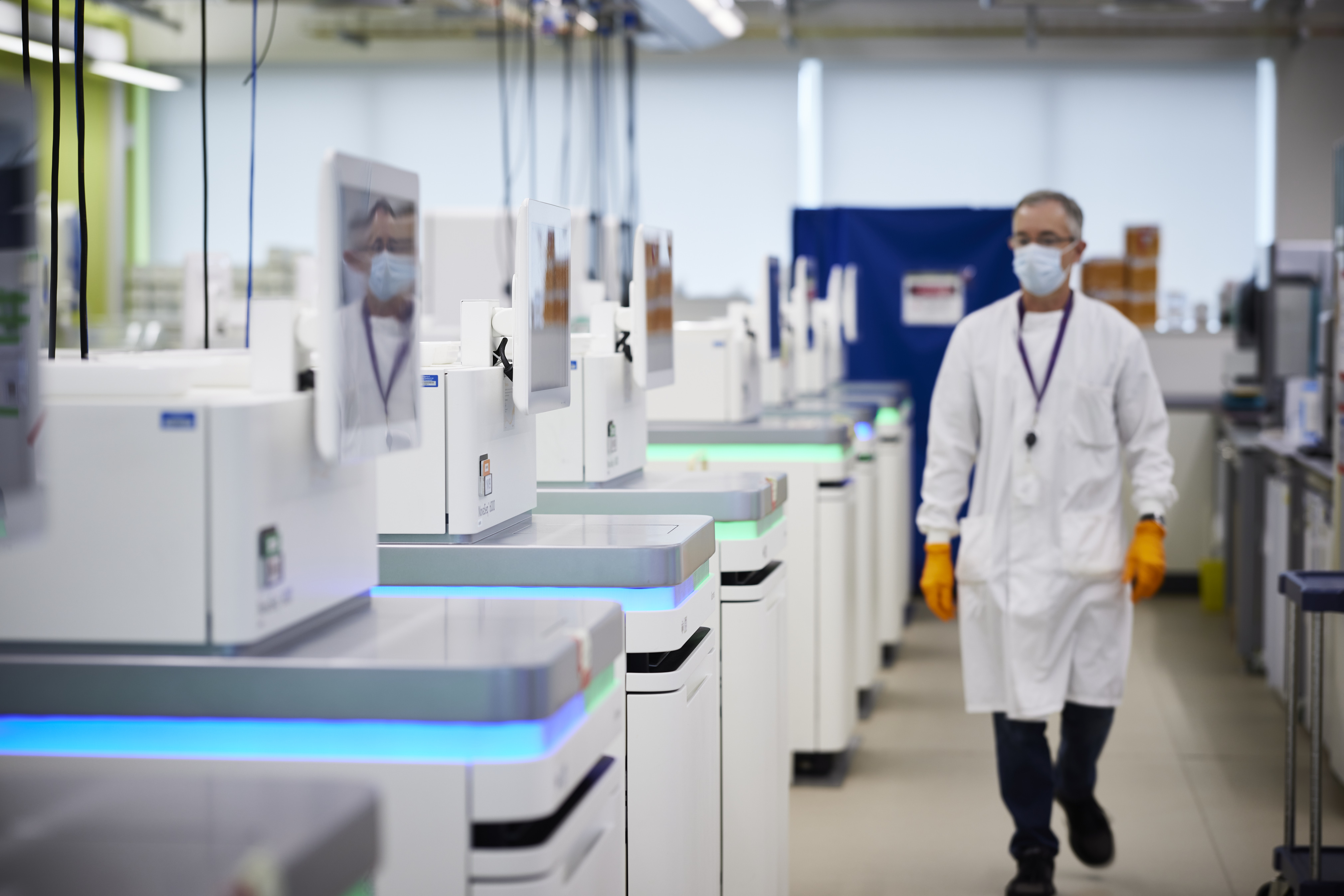 Gary Hornett in sequencing laboratory, working at Illumina NovaSeq 600 machines